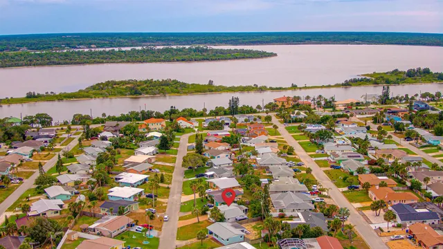 a view of a yard with a table and chair