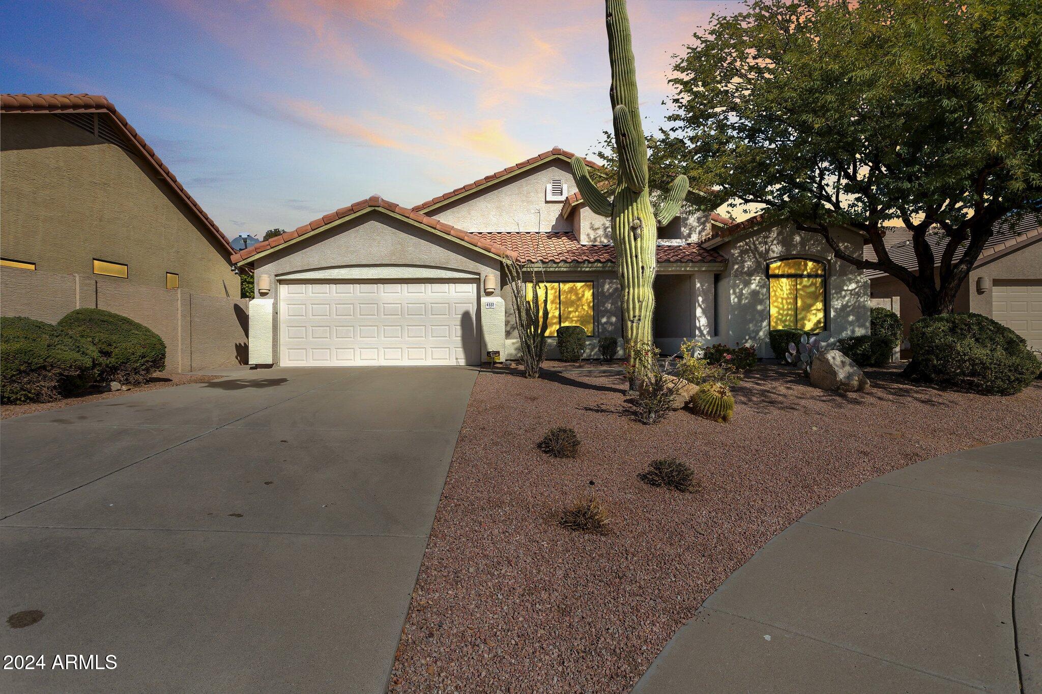 4522 East Jaeger Road Phoenix, AZ 85050 - Photo 1 of 28 Front View at Dusk