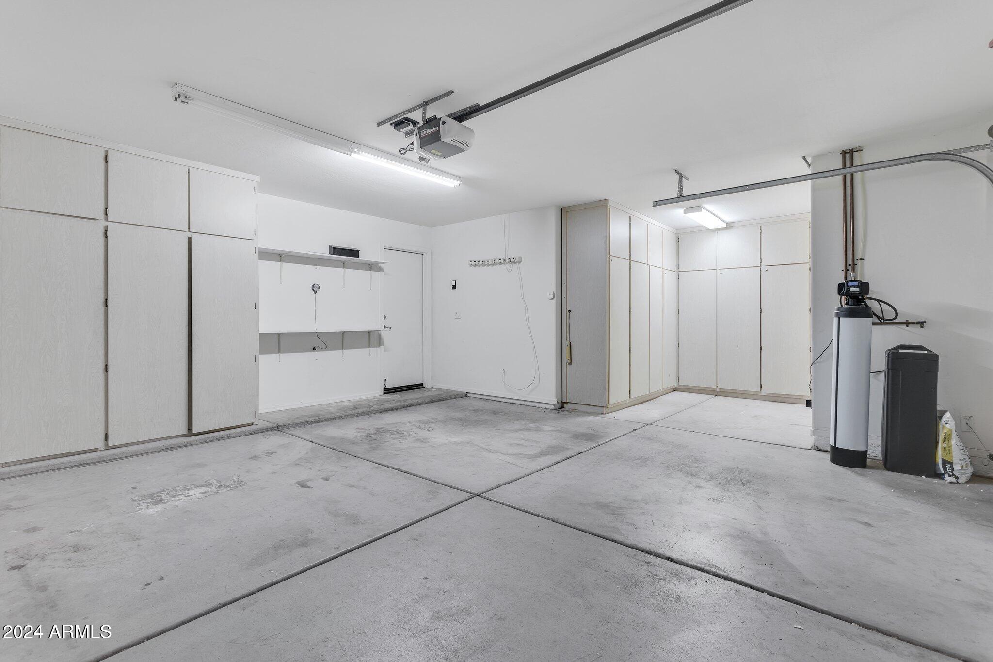 4522 East Jaeger Road Phoenix, AZ 85050 - Photo 23 of 28 2 Car Garage with extra storage space
