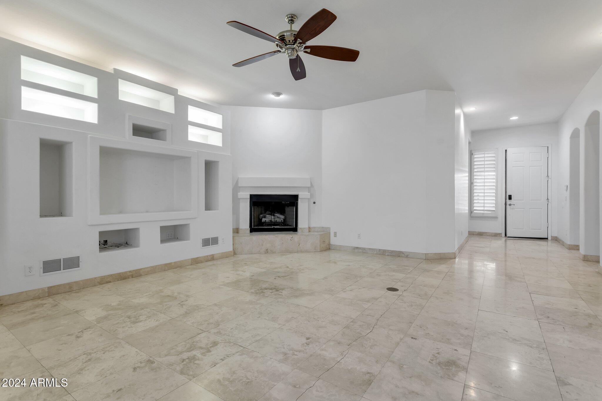 4522 East Jaeger Road Phoenix, AZ 85050 - Photo 7 of 28 Great Room Fireplace