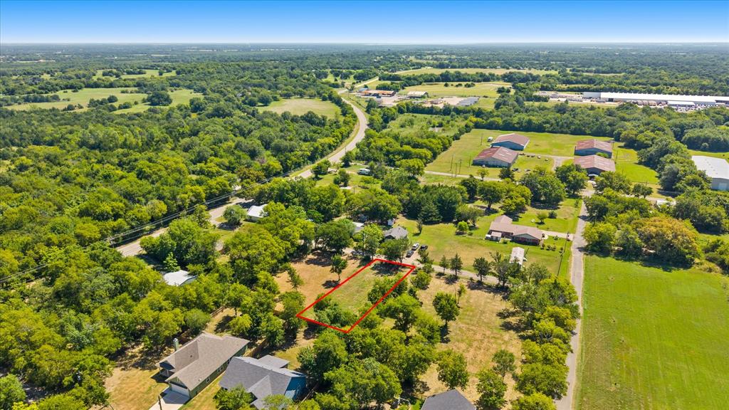 405 3rd Street Commerce, TX 75428 - Photo 24 of 26 Expansive lot with mature trees and surrounding green spaces