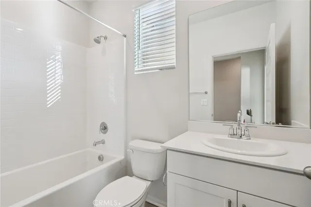 a bathroom with a sink toilet and bathtub