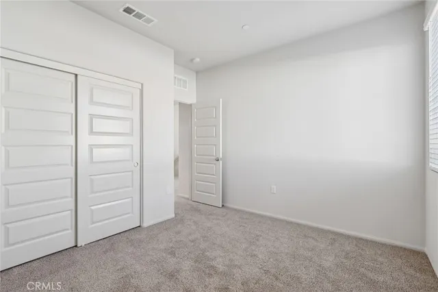 an empty room with closet