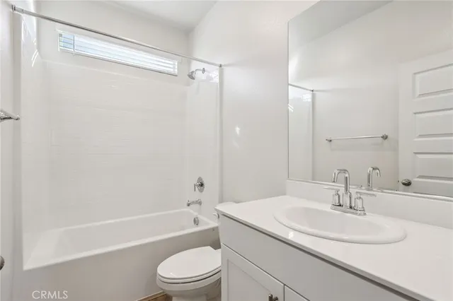a bathroom with a sink toilet and a bathtub