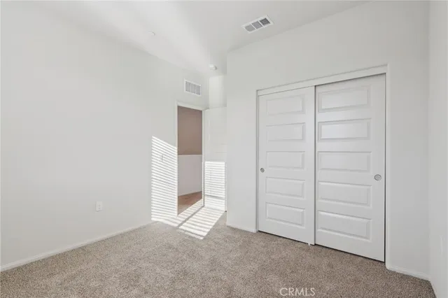 an empty room with closet