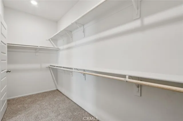 a view of a room with racks on the wall