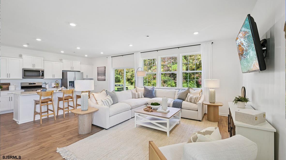 500 Scotty Boulevard, Unit 1201 Rio Grande, NJ 08242 - Photo 10 of 43 a living room with furniture and a large window