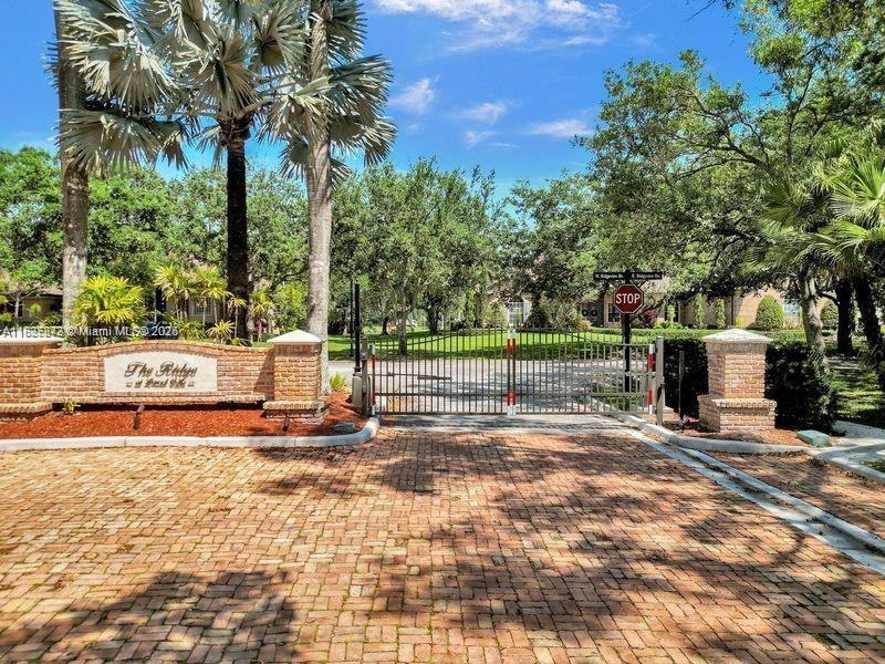 Vacant E Ridgeview Dr East Vacant E Ridgeview Drive Davie, FL 33330 - Photo 3 of 9 a view of a park with swings and slides