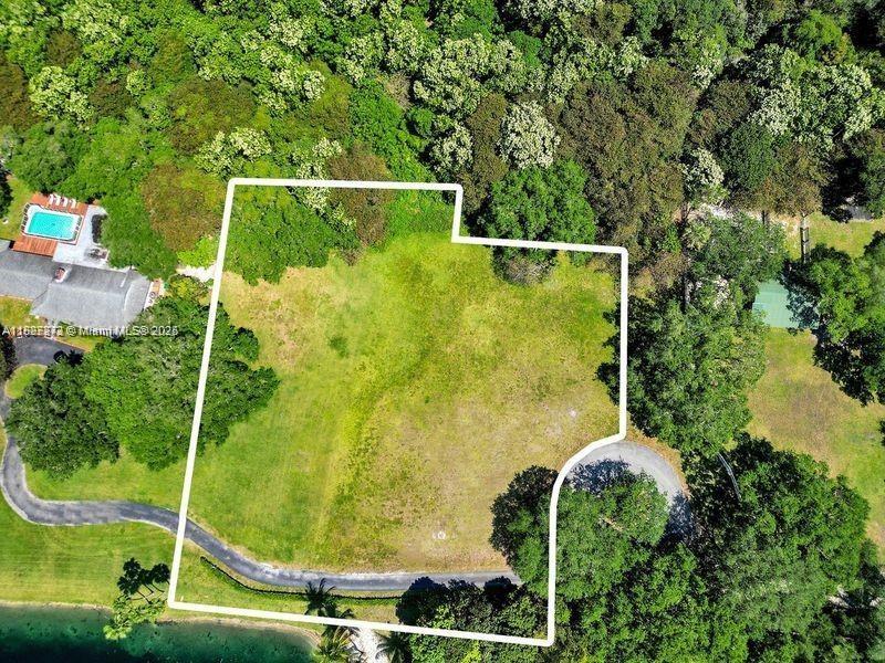 Vacant E Ridgeview Dr East Vacant E Ridgeview Drive Davie, FL 33330 - Photo 8 of 9 a view of a tennis court