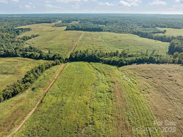 a view of a yard with an ocean