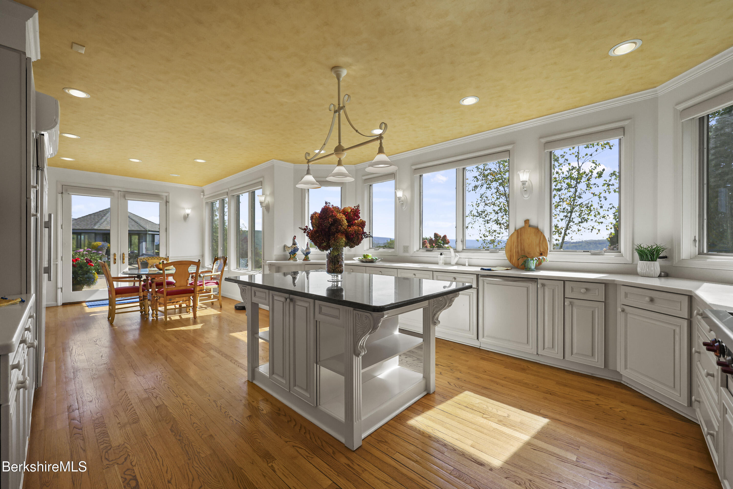 60 Old Cheshire Road Lanesborough, MA 01237 - Photo 17 of 81 a kitchen with counter and wooden floor