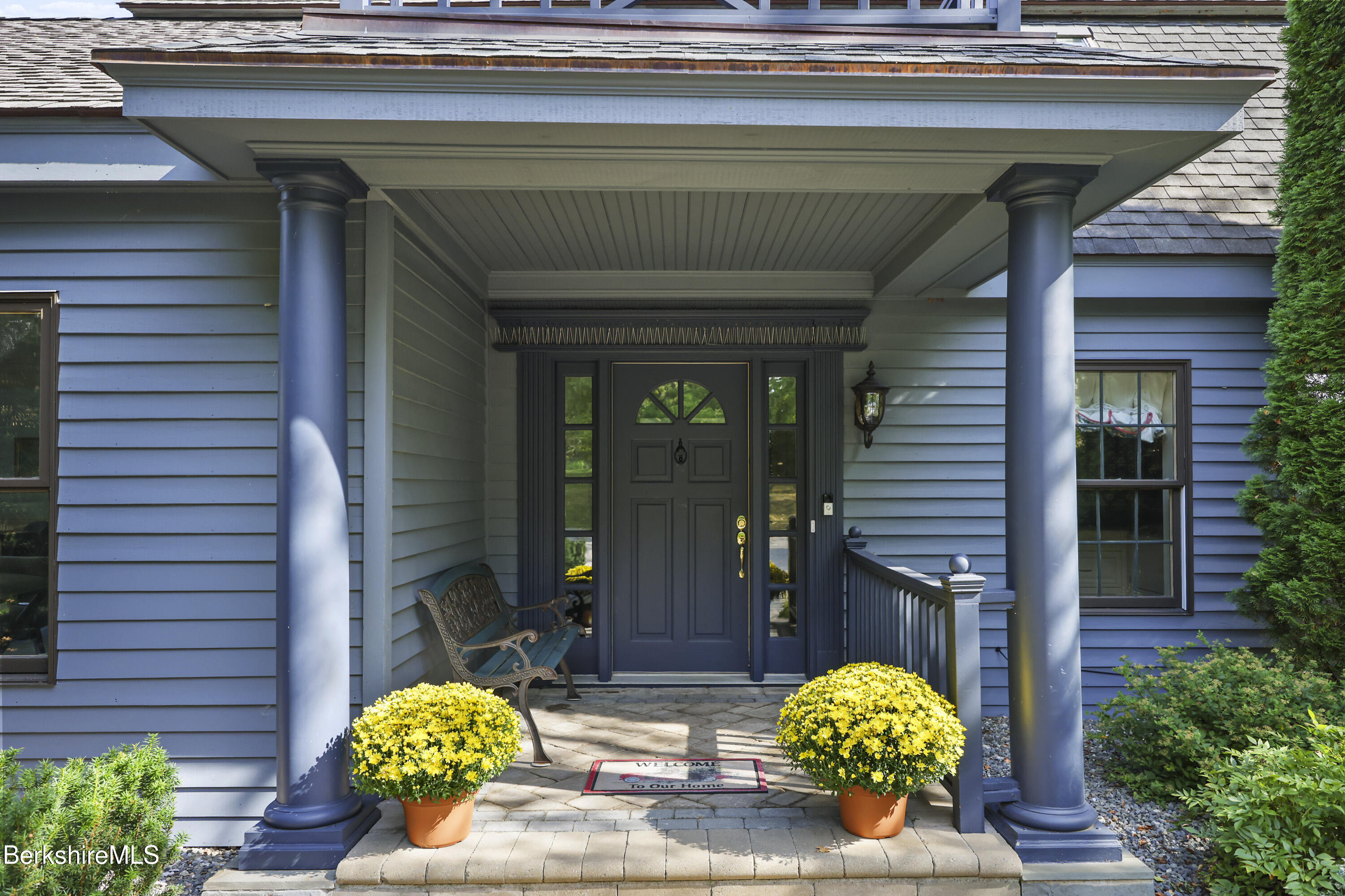 60 Old Cheshire Road Lanesborough, MA 01237 - Photo 6 of 81 a front view of a house with outdoor seating