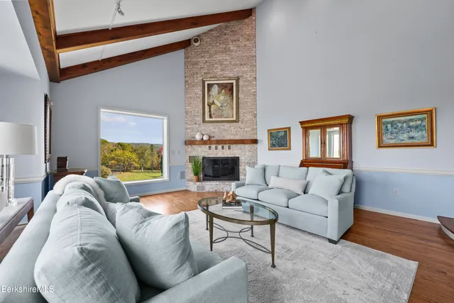 a view of counter top space sink and hallway