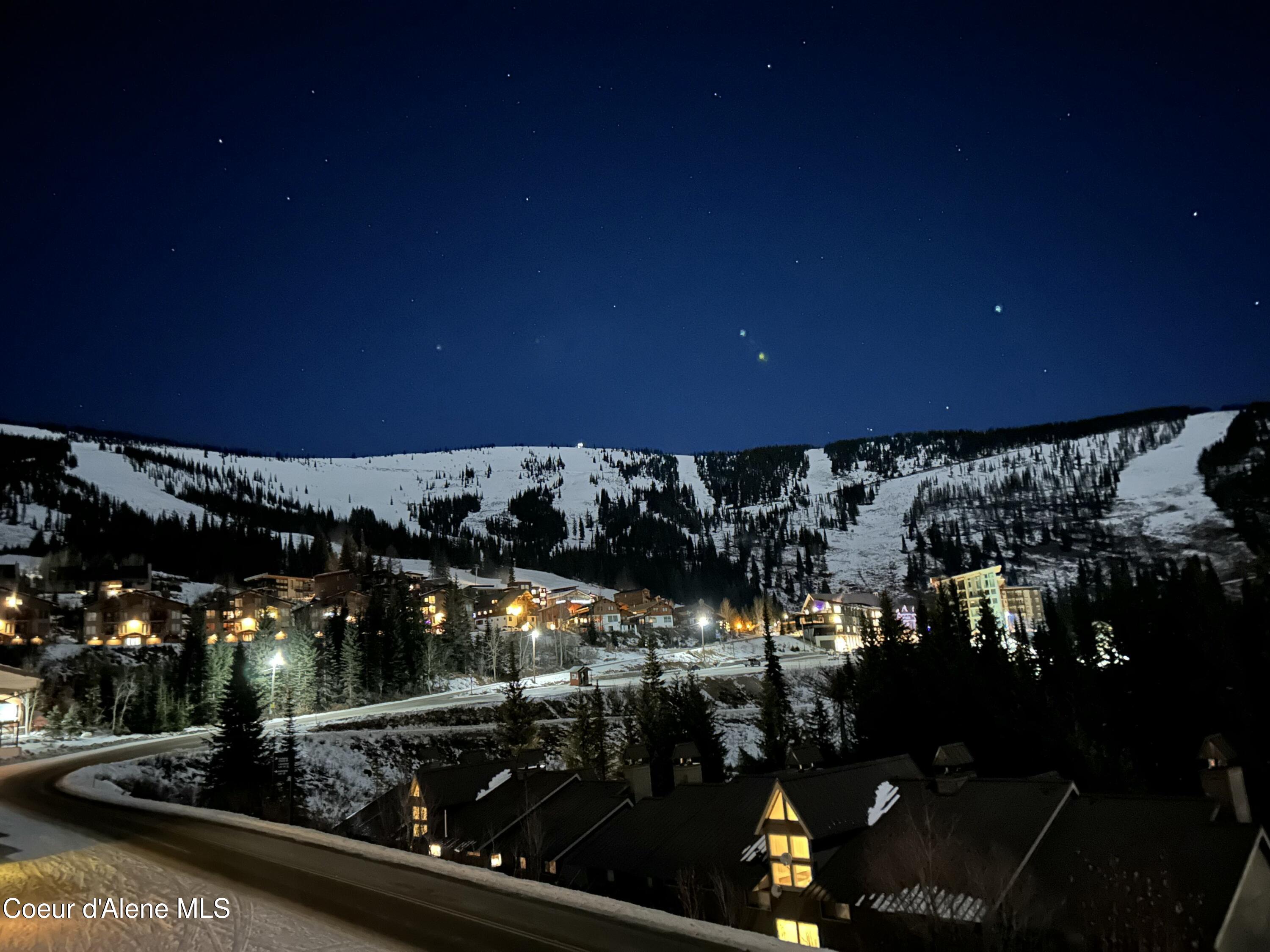 8754 Schweitzer Mountain Road, Unit 20 Sandpoint, ID 83864 - Photo 17 of 32 Village View At Night