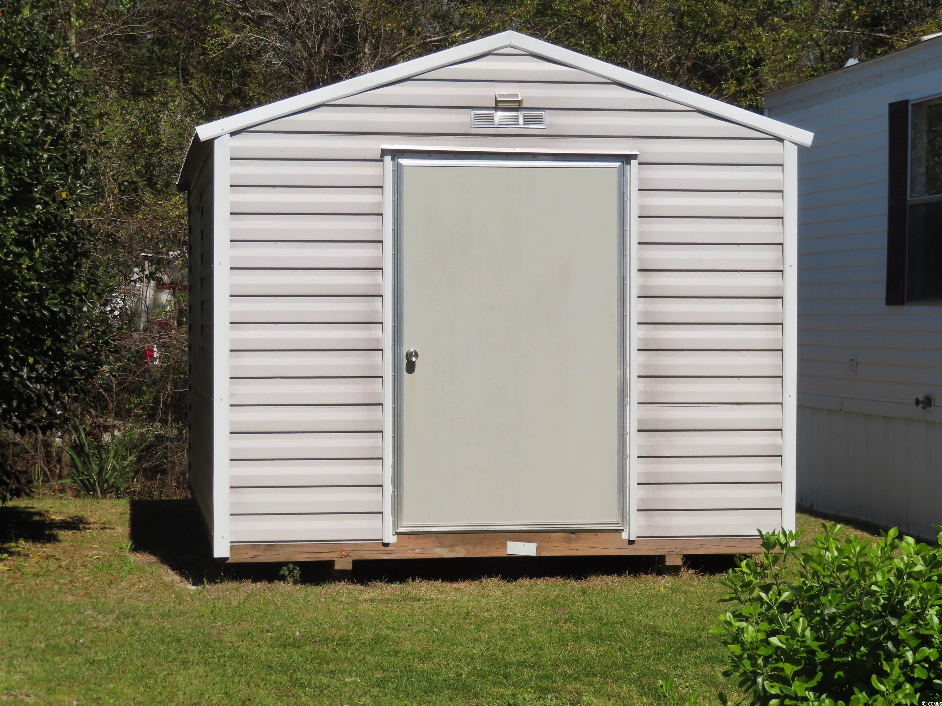 9323 Shoveler Drive Murrells Inlet, SC 29576 - Photo 5 of 23 View of shed