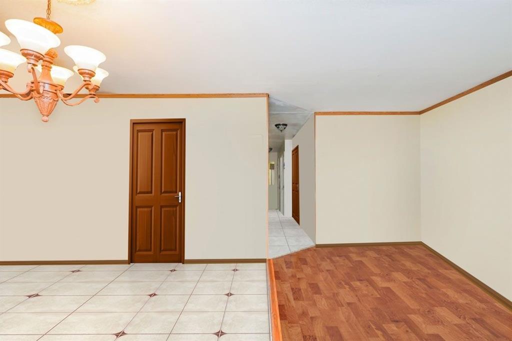 2329 West Street Brooklyn, NY 11223 - Photo 11 of 26 a view of a room with a dresser
