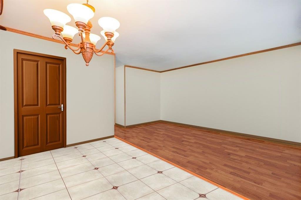 2329 West Street Brooklyn, NY 11223 - Photo 12 of 26 a view of a room with wooden floor