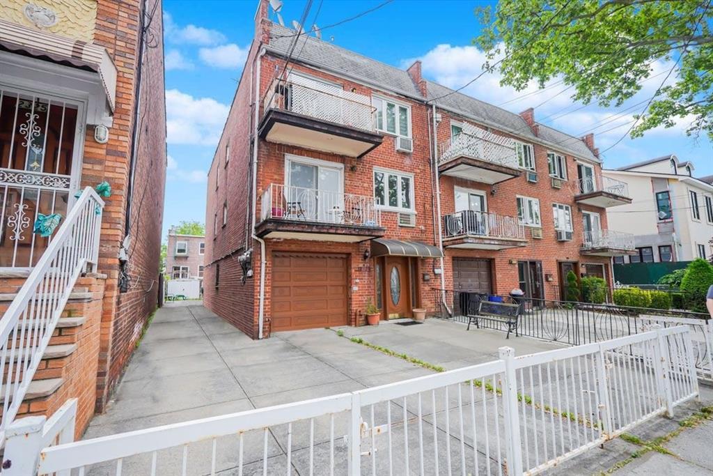 2329 West Street Brooklyn, NY 11223 - Photo 2 of 26 front view of a building with a street
