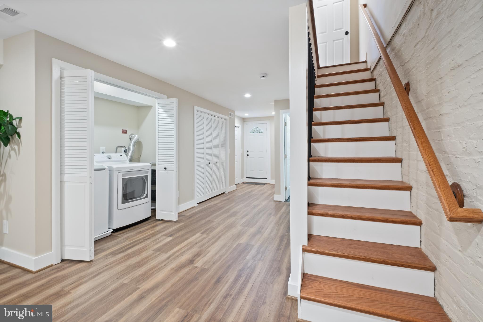 607 Tuckerman Street Northwest Washington, DC 20011 - Photo 12 of 25 a view of a hallway with wooden floor and entryway
