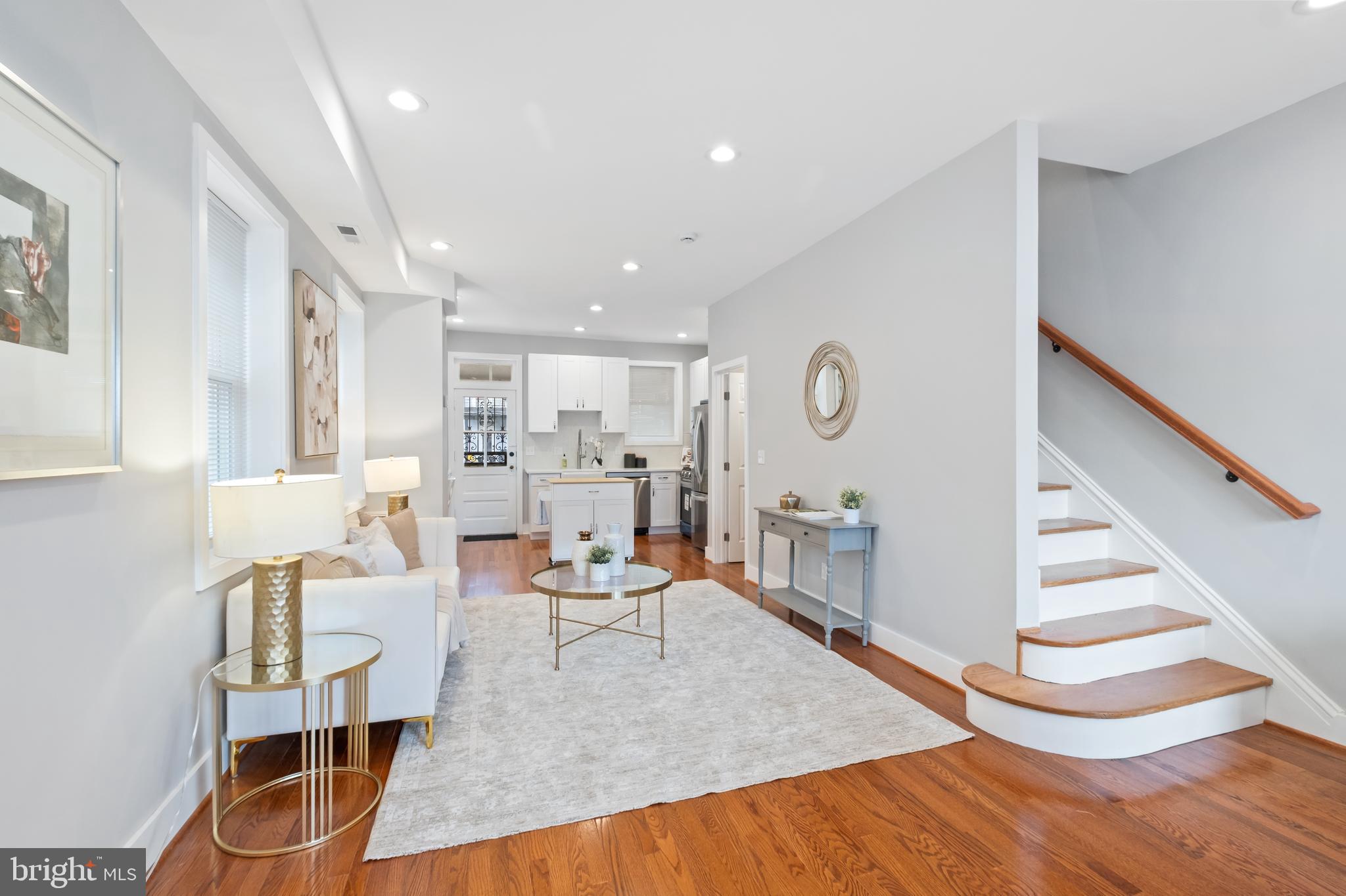 607 Tuckerman Street Northwest Washington, DC 20011 - Photo 2 of 25 a living room with furniture and wooden floor