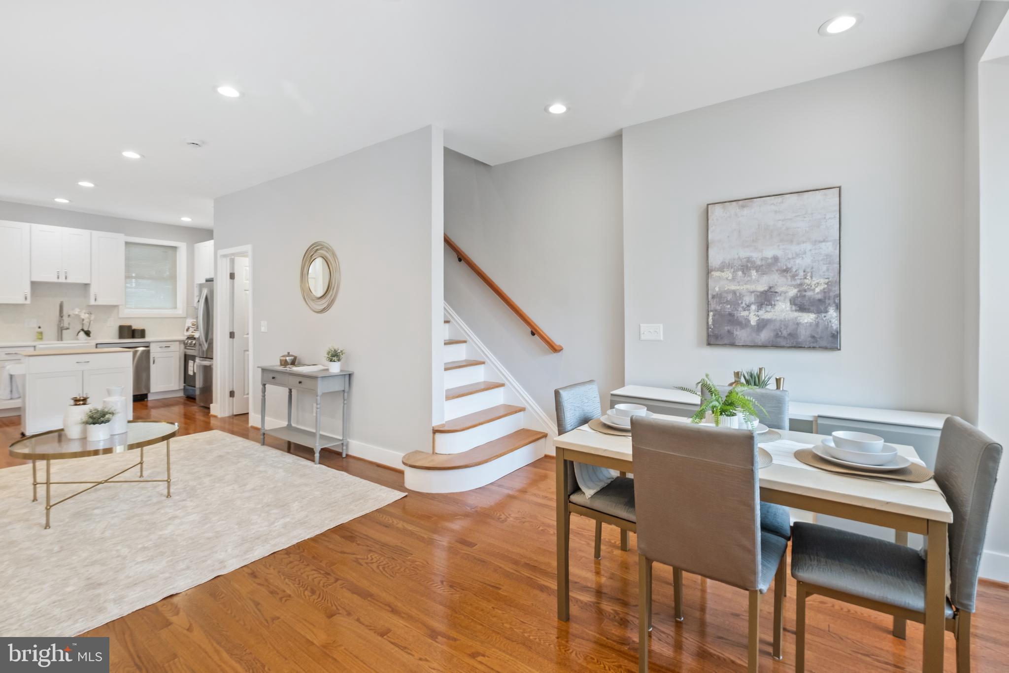 607 Tuckerman Street Northwest Washington, DC 20011 - Photo 4 of 25 a living room with furniture and wooden floor