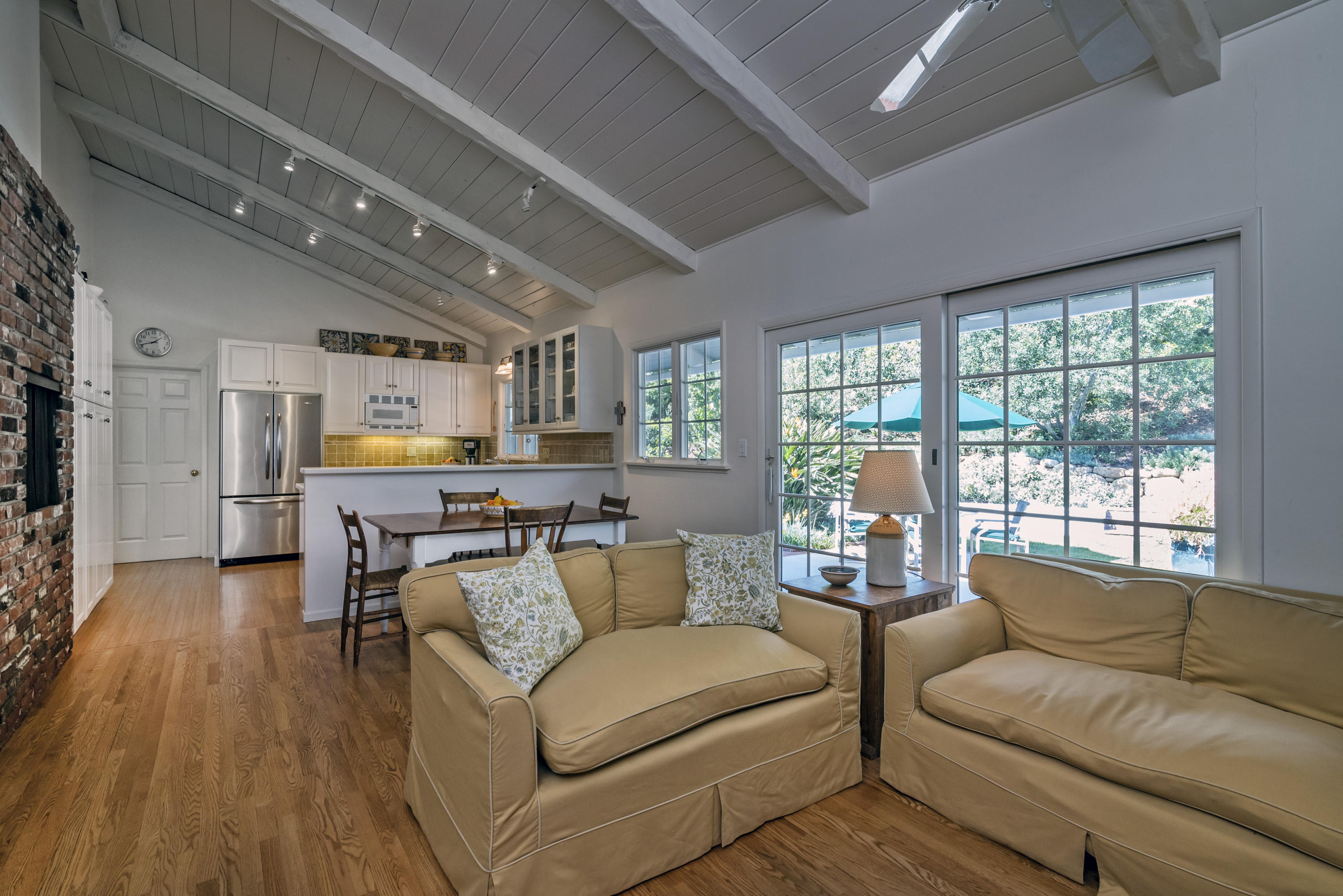 207 Alston Road Santa Barbara, CA 93108 - Photo 3 of 14 a living room with furniture and a large window