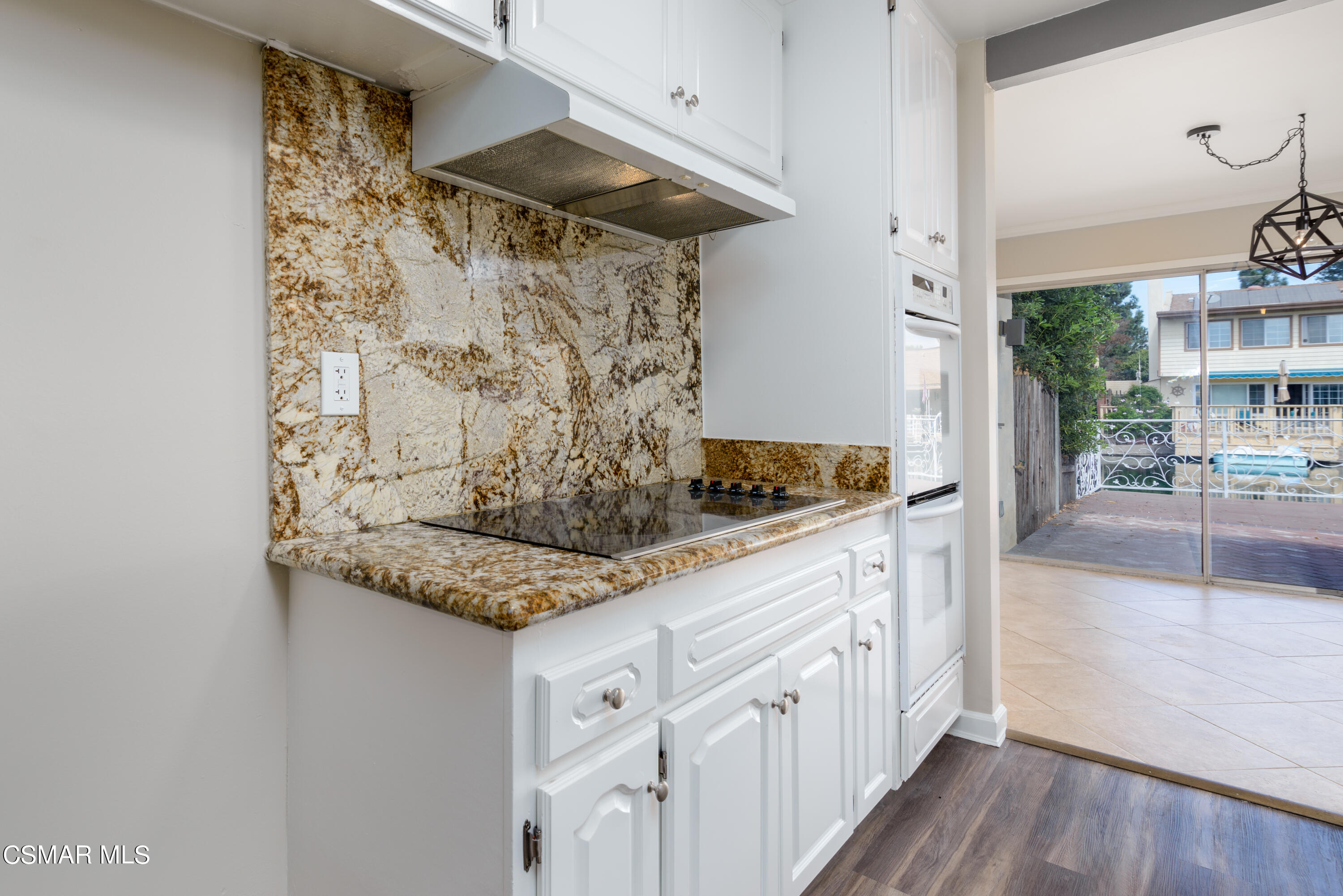 1667 Edgewater Lane Camarillo, CA 93010 - Photo 11 of 32 a kitchen with stainless steel appliances granite countertop a sink and cabinets