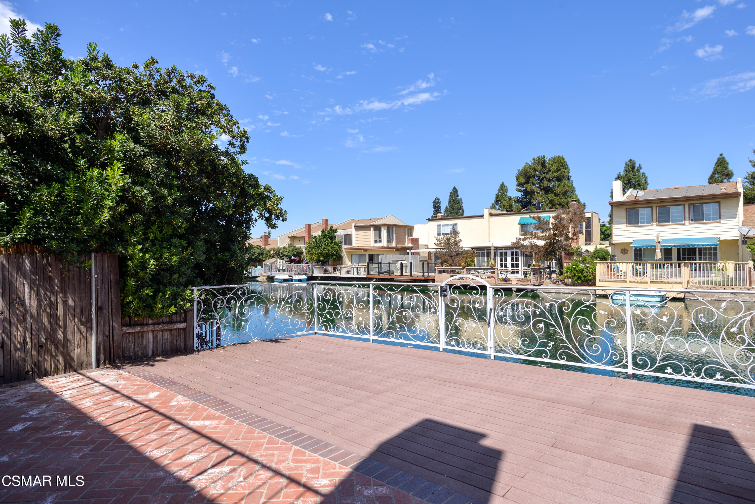 1667 Edgewater Lane Camarillo, CA 93010 - Photo 13 of 32 a balcony with tall trees in front of it