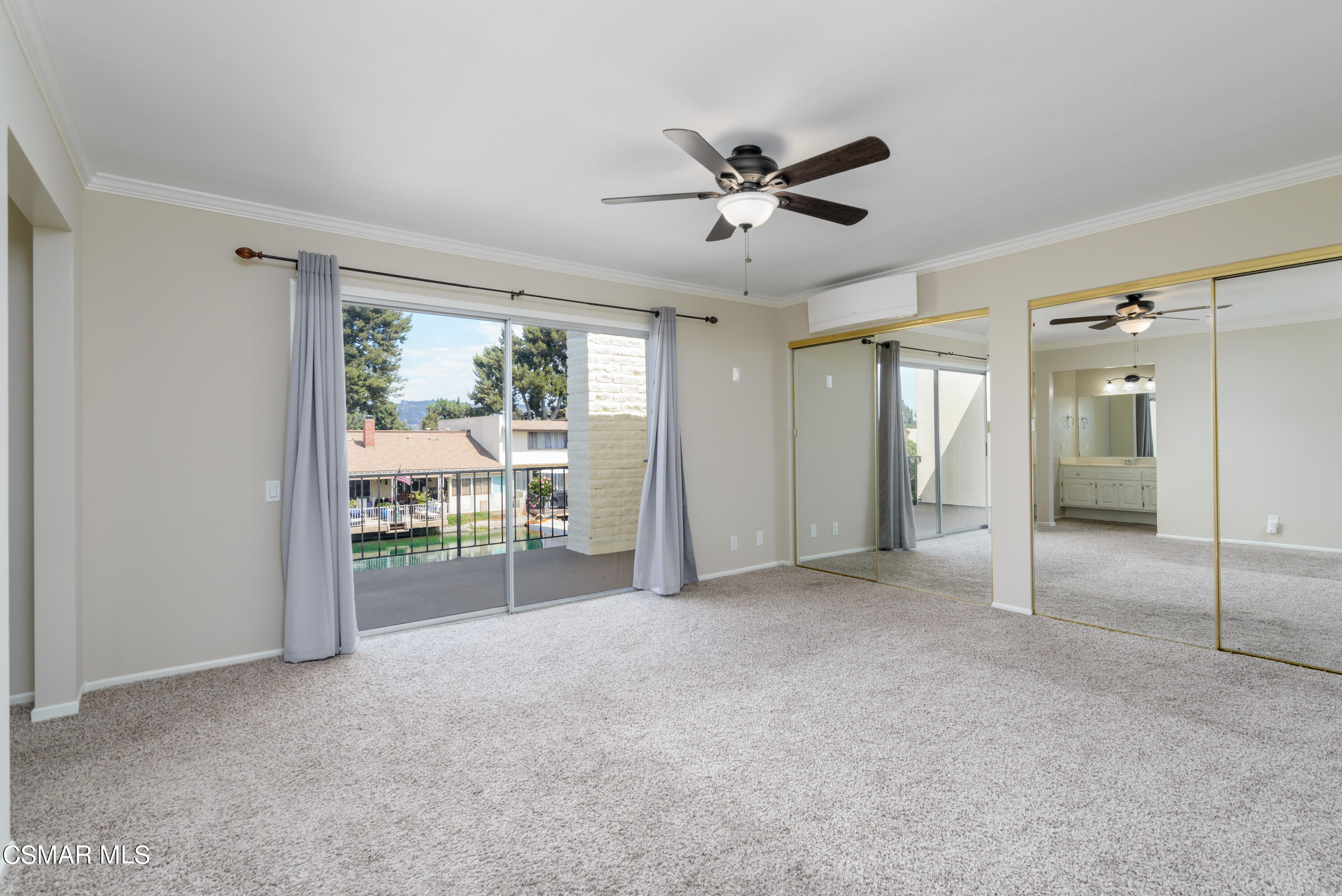 1667 Edgewater Lane Camarillo, CA 93010 - Photo 16 of 32 a view of a livingroom with a ceiling fan and window