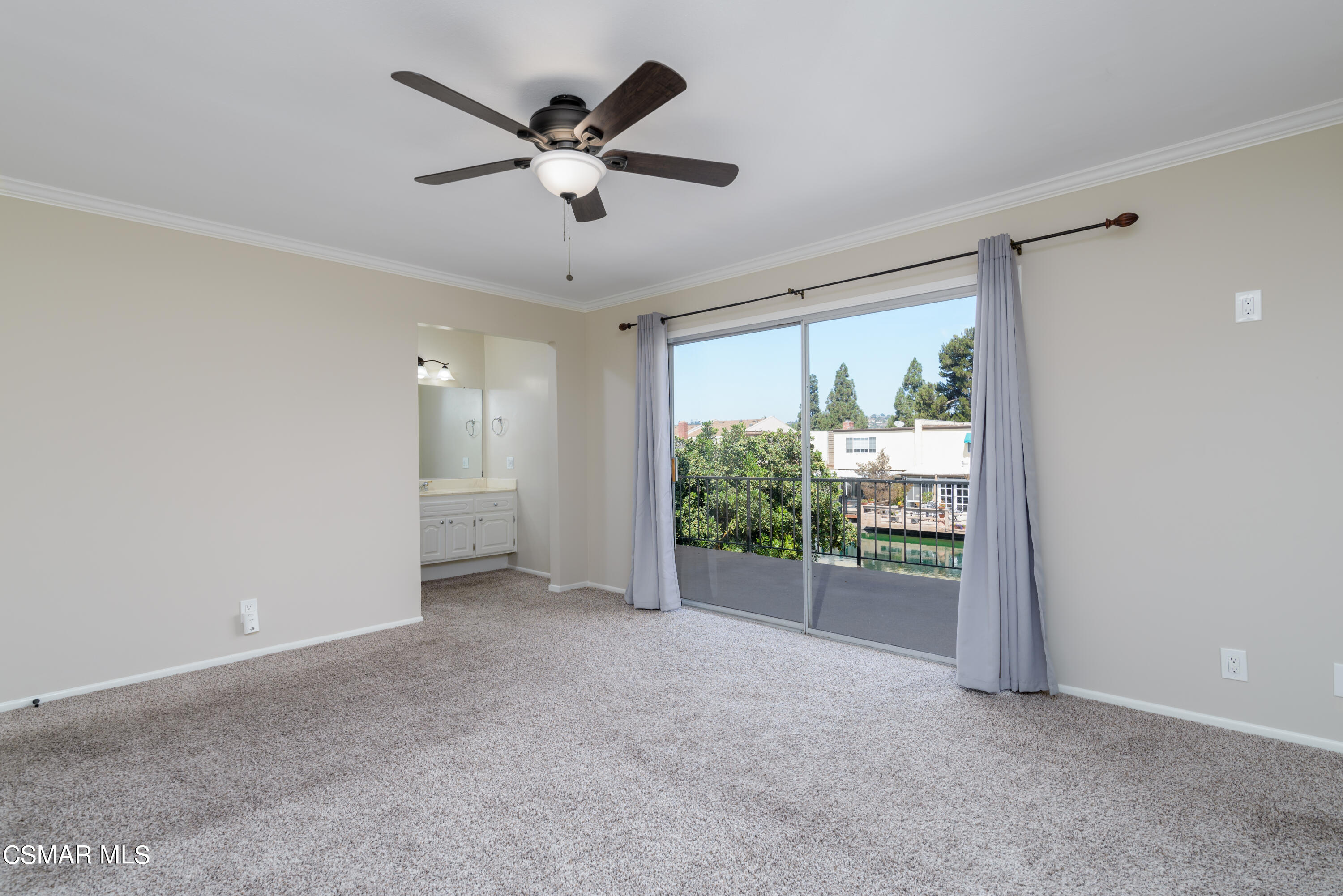 1667 Edgewater Lane Camarillo, CA 93010 - Photo 17 of 32 a view of a livingroom with a ceiling fan and window