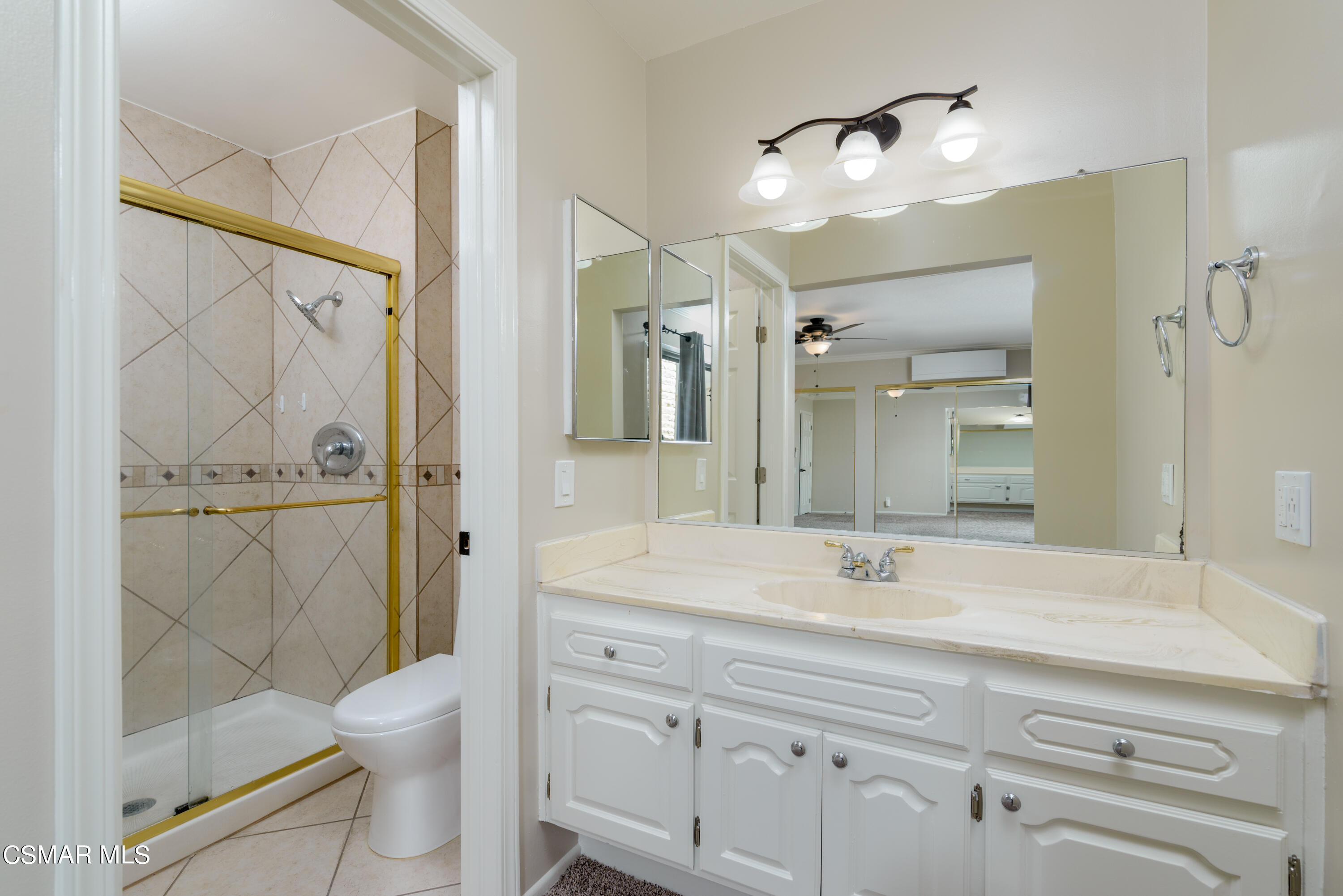 1667 Edgewater Lane Camarillo, CA 93010 - Photo 20 of 32 a bathroom with a sink a toilet and shower