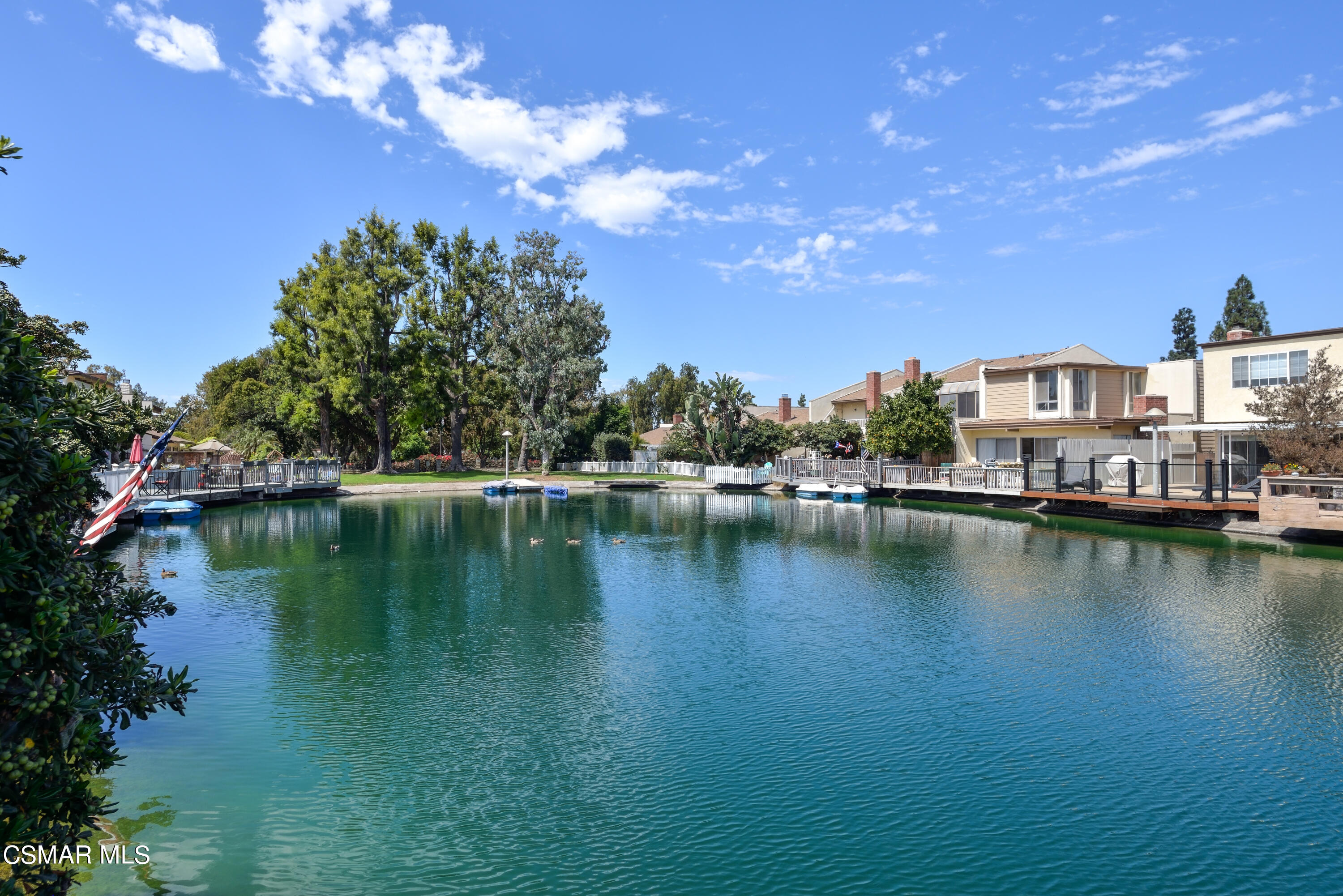 1667 Edgewater Lane Camarillo, CA 93010 - Photo 28 of 32 a view of a lake with boats and trees in the background