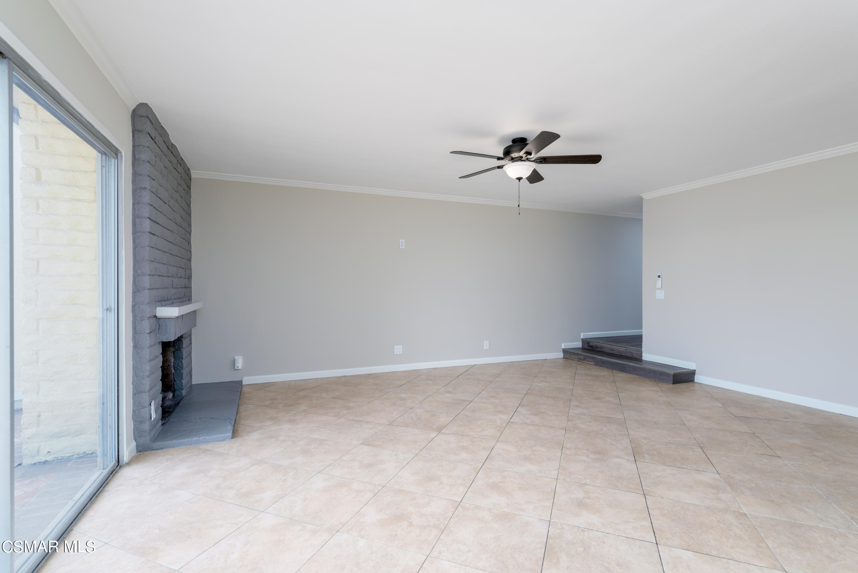 1667 Edgewater Lane Camarillo, CA 93010 - Photo 5 of 32 an empty room with a ceiling fan and a window