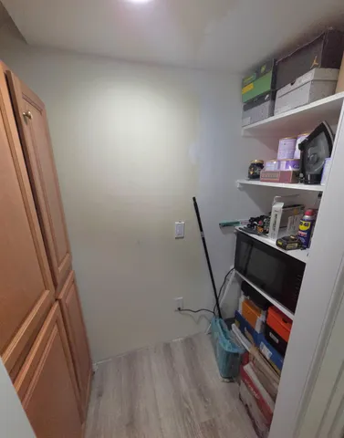 a room with storage and utility