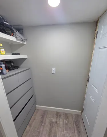 a view of storage and utility room with washer and dryer