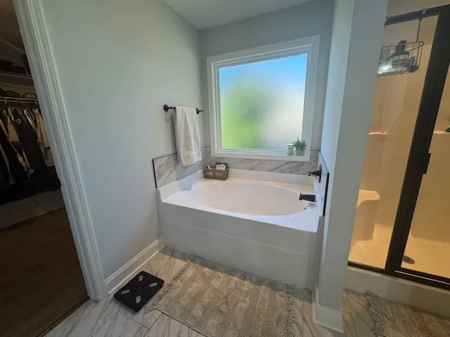 a bathroom with a sink and a tub