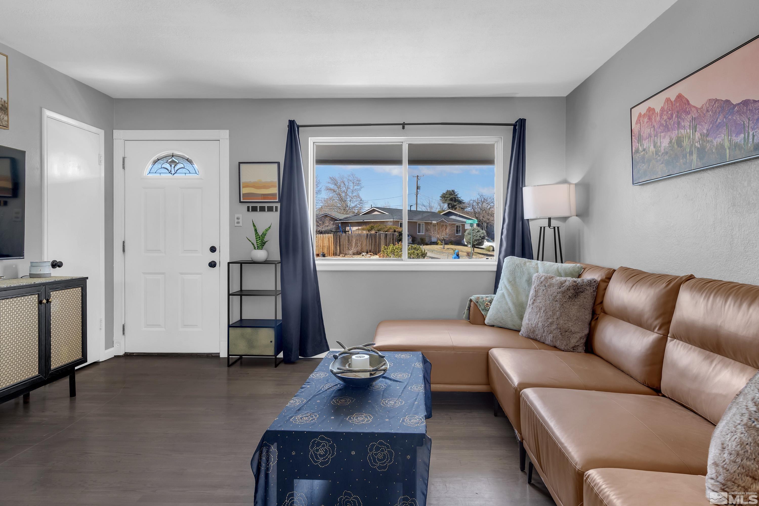 770 Ibis Lane Reno, NV 89503 - Photo 6 of 31 a living room with furniture and a flat screen tv
