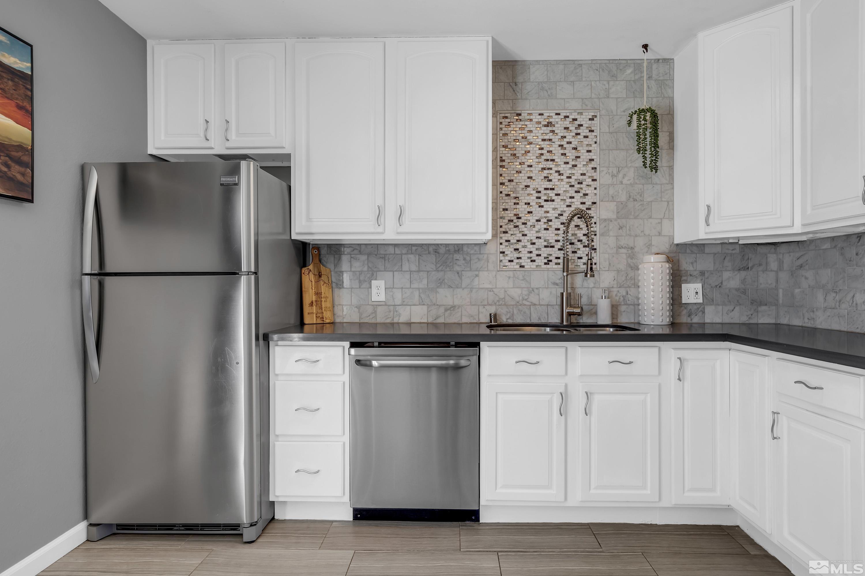770 Ibis Lane Reno, NV 89503 - Photo 8 of 31 a white refrigerator freezer sitting inside of a kitchen