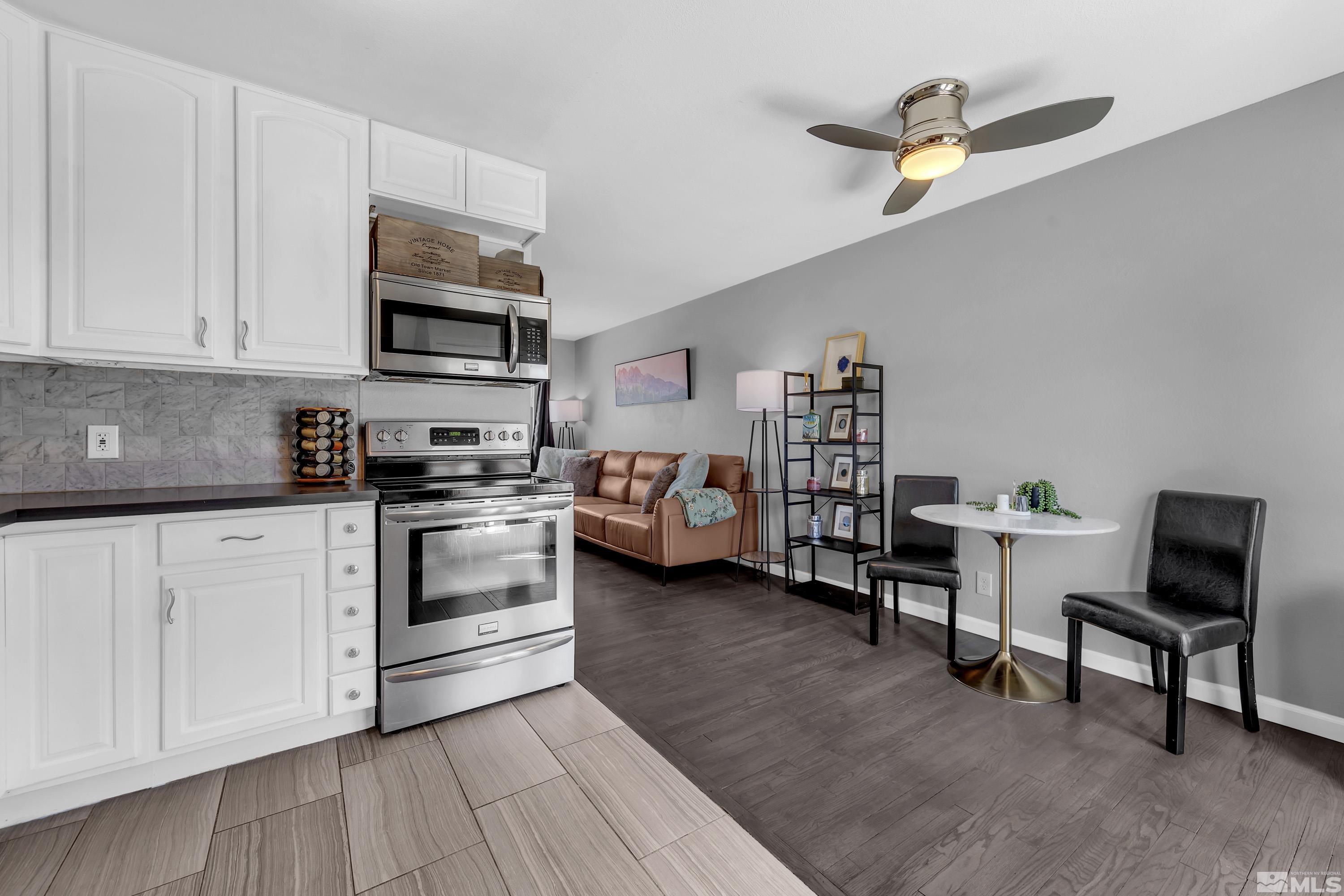770 Ibis Lane Reno, NV 89503 - Photo 9 of 31 a kitchen with a refrigerator and cabinets