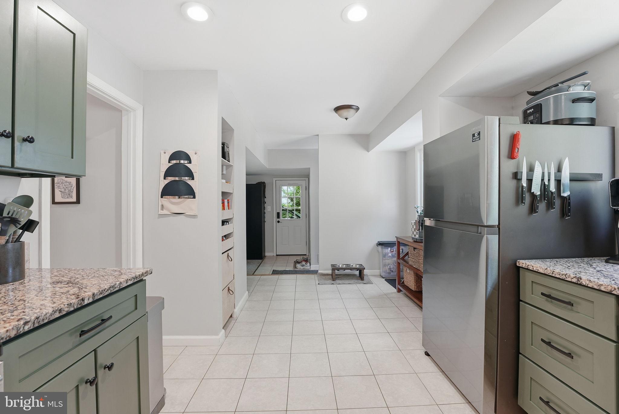 9205 Ivanhoe Road Fort Washington, MD 20744 - Photo 6 of 21 Modern kitchen with sleek finishes.