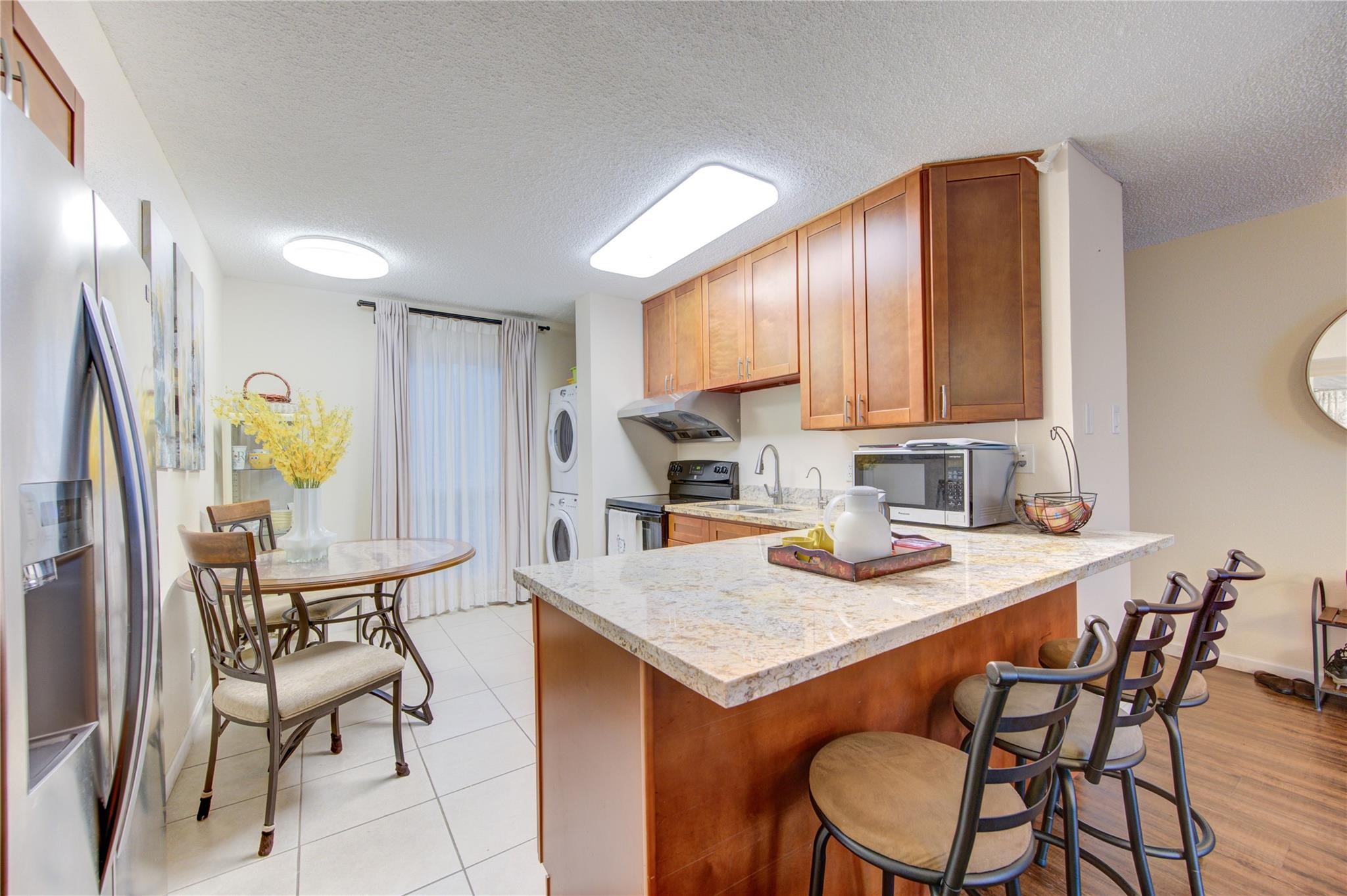 1901 South Voss Road, Unit 4 Houston, TX 77057 - Photo 11 of 26 a view of a dining room with furniture