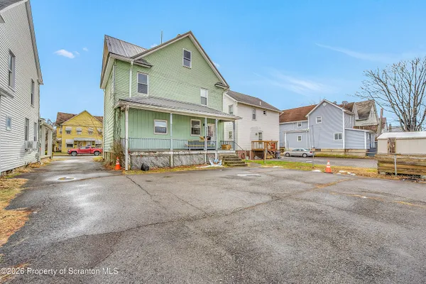 a view of the house with a street