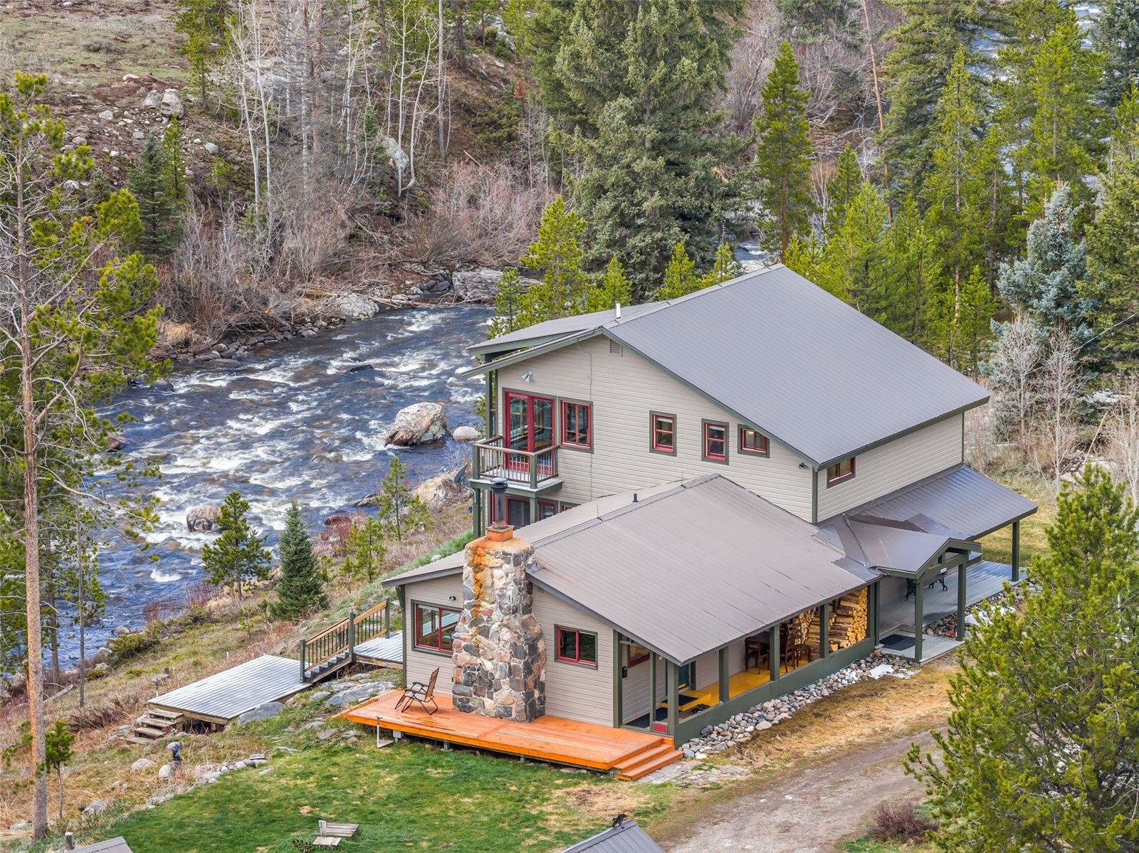 31405 Seedhouse Road Clark, CO 80428 - Photo 1 of 50 an aerial view of residential houses with yard