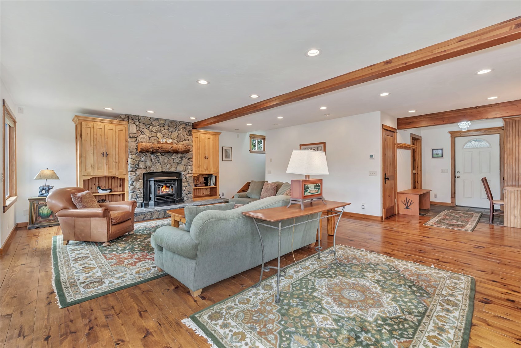 31405 Seedhouse Road Clark, CO 80428 - Photo 11 of 50 a living room with furniture flat screen tv and a fireplace