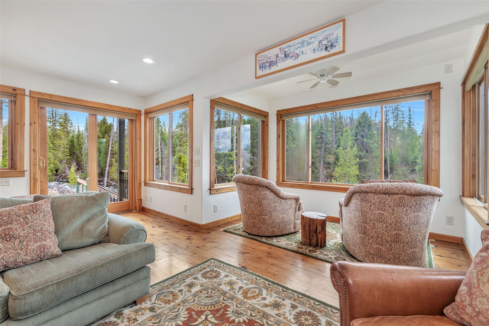 31405 Seedhouse Road Clark, CO 80428 - Photo 12 of 50 a living room with furniture and a large window