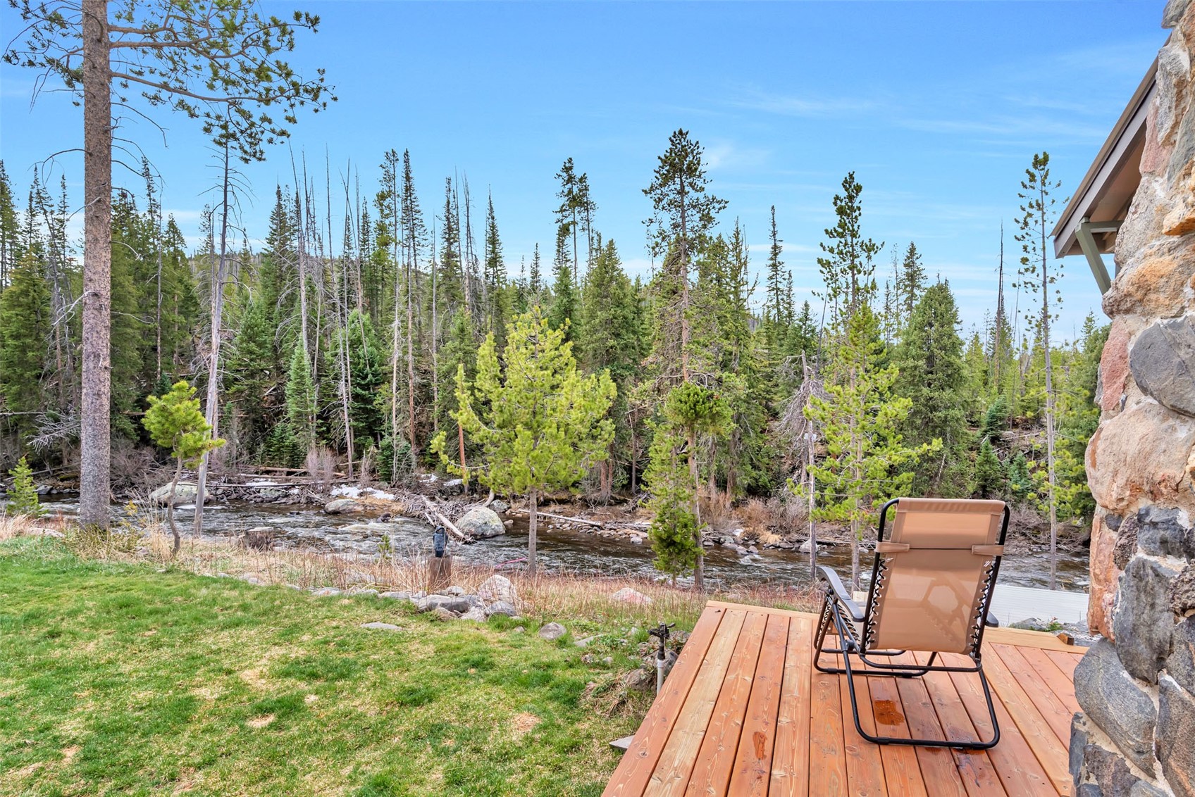 31405 Seedhouse Road Clark, CO 80428 - Photo 19 of 50 a view of a chairs and table on the wooden deck