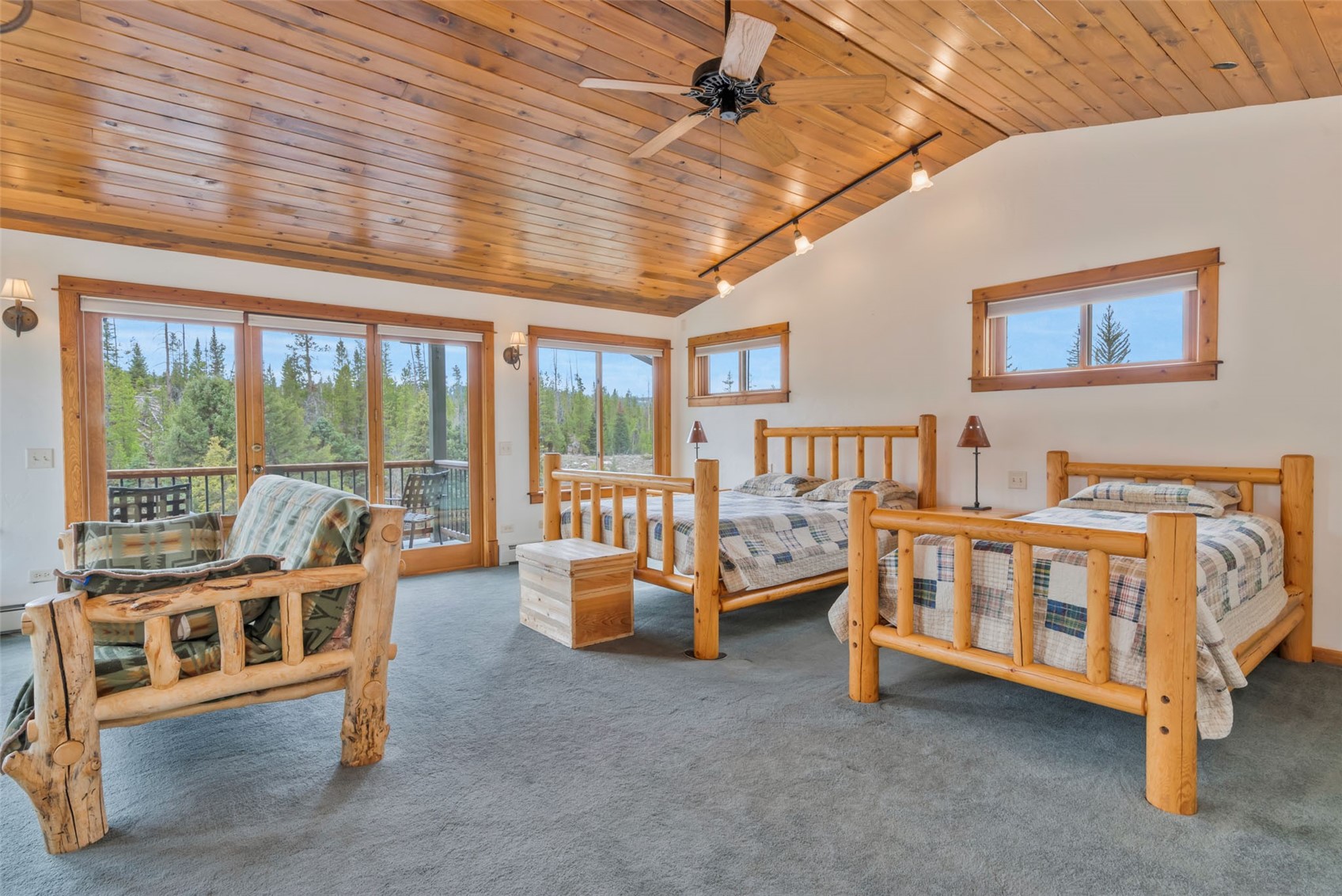 31405 Seedhouse Road Clark, CO 80428 - Photo 22 of 50 a large bedroom with furniture and a large window