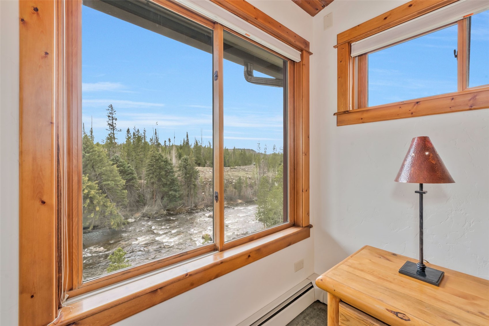 31405 Seedhouse Road Clark, CO 80428 - Photo 28 of 50 a room that has a window and a wooden floor