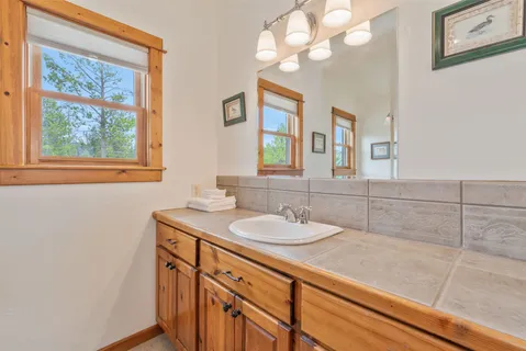 a bathroom with a shower and toilet
