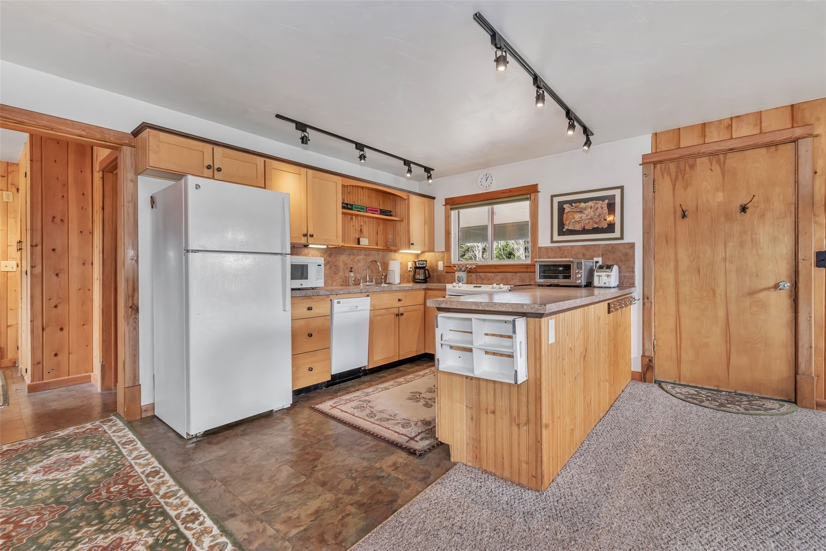 31405 Seedhouse Road Clark, CO 80428 - Photo 36 of 50 a kitchen with stainless steel appliances granite countertop a refrigerator and a stove top oven